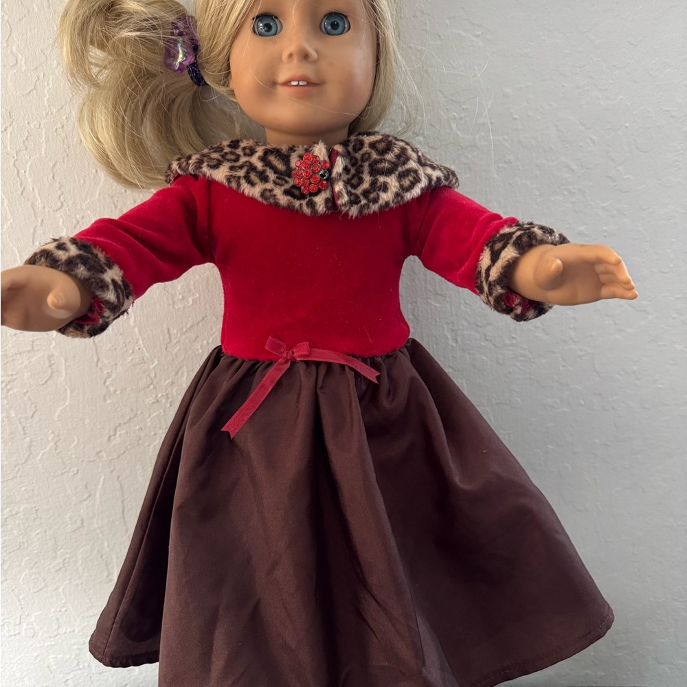 American Girl Doll with Red and Brown Doll Dress with Leopard Print Trim